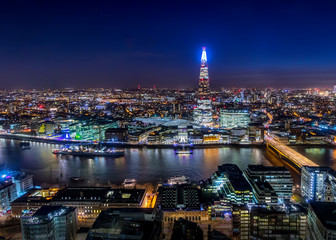 View of London City Skyline and the Thames River from the Rooftop at Night, UK