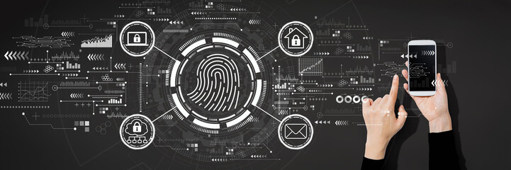 Fingerprint scanning theme with person using a white smartphone