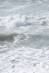 detalle de olas de la playa 