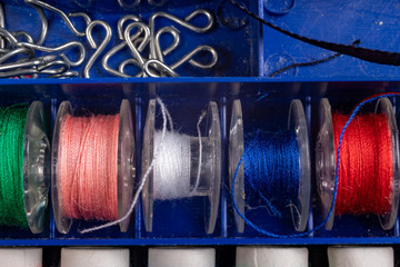 Sewing threads and needles. Accessories for small tailoring works.