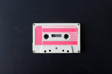 Obraz premium Old tape cassette, old or aged wood background. İsolated casette