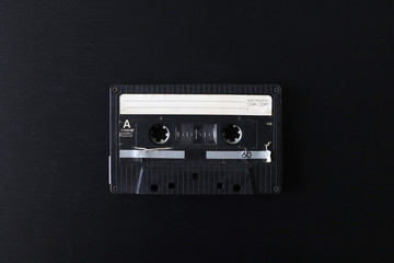 Obraz premium Old tape cassette, old or aged wood background. İsolated casette