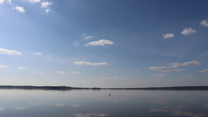 Fototapeta na wymiar sky reflection in lake water