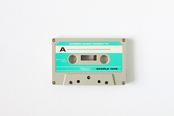 Obraz premium Old tape cassette, old or aged wood background. İsolated casette
