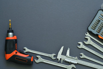 Inscription Fathers Day with different tools on grey background. Flat lay. top view