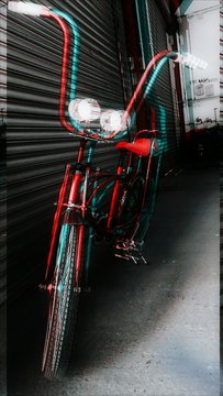 Bicycle Parked Against Closed Shop