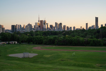 Fototapeta na wymiar Toronto City Skyline at sunset from Riverdale Park East in Ontario Canada