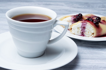 Morning tea, crepes with cottage cheese and jam