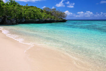 Sandy beach at Gee island in Ouvea lagoon, Loyalty Islands, New Caledonia