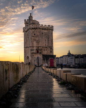 Saint-nicolas Tower in the old harbour of La Rochelle at sunset
