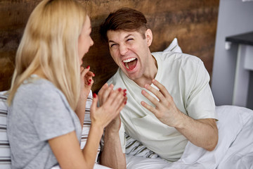 young man can no longer control himself, he spills anger at his wife at home. problems, misunderstanding in family