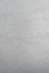 Texture of a rough black surface of a notebook