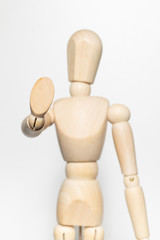 Mannequin raising arm indicating stop