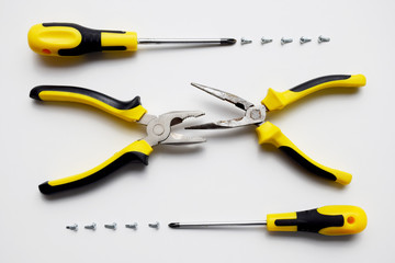 Set of working tools, pliers, wire cutters,, screwdrivers and screws. Building kit. Repair service, building, handyman, carpentry, service center