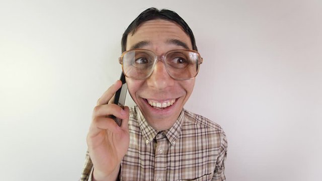 Funny man talking on the phone with his mom