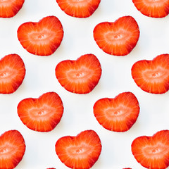 Photographic collage, seamless pattern with Isolated heart shape red strawberry cut in half on a white background. Macro square image about fresh organic berries, harvets, healthy food and vitamin C