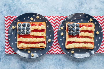 American flag toast with banana, strawberry jam and blueberry for breakfast