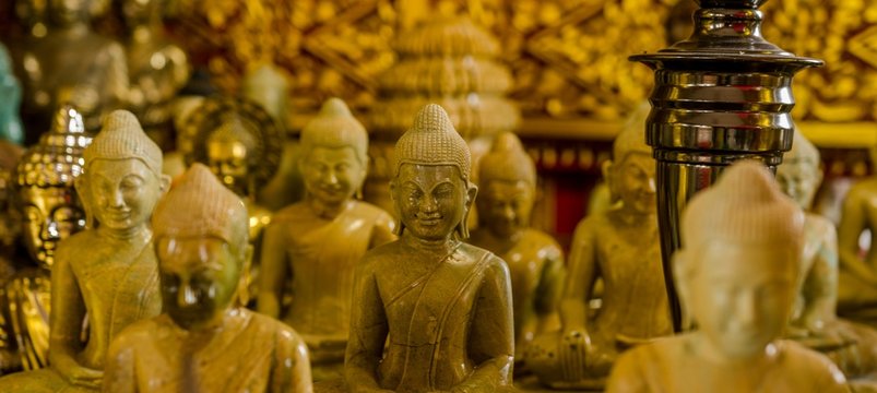 Several  Buddha Statues  doing Meditation 
