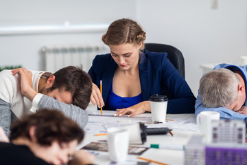 Business people sleeping in the conference room during a meeting