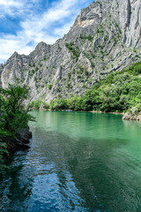 Matka Canyon and Matka Lake - located west of central Skopje, North Macedonia. It is one of the most popular outdoor destinations in Macedonia and home to several medieval monasteries - obrazy, fototapety, plakaty