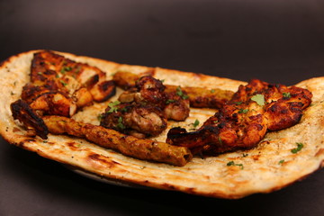 Desi Indian Pakistani BBQ Tikka Platter with Afghani Naan