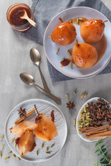 Poached pears delicious home made recipe over light kitchen countertop