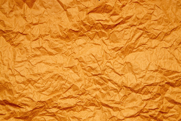 Crumpled brown paper background, textured effect. Wrapping paper, craft sheet, old card.