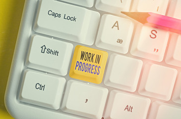 Writing note showing Work In Progress. Business concept for unfinished project that still added to...