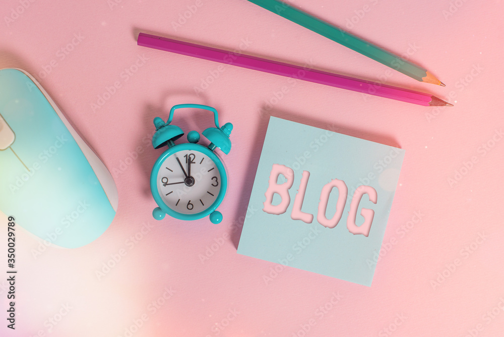 Poster Text sign showing Blog. Business photo showcasing regularly updated website web page run by individual Alarm clock wakeup blank notepad mouse markers colored background