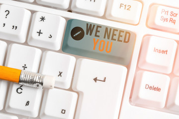 Conceptual hand writing showing We Need You. Concept meaning asking someone to work together for...