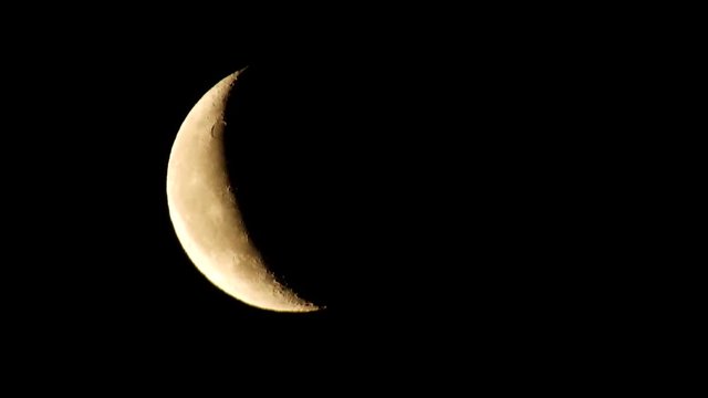 crescent phase of the moon, crescent moon in the sky,