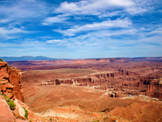 Distant blue skies and bright clouds on the Canyon landscape, Utah, USA
