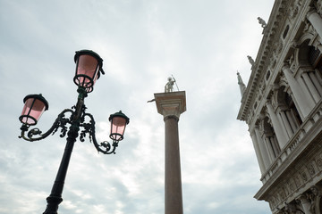 Fototapeta na wymiar St. Mark's Square Statues and light posts Venice Italy