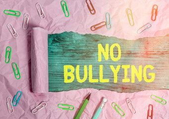 Writing note showing No Bullying. Business concept for stop aggressive behavior among children...