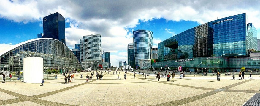 People At La Defense Against Sky