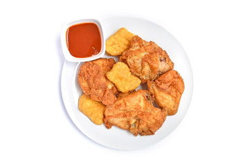 Crispy fried chicken  in a white plate on white background