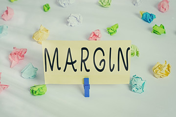 Conceptual hand writing showing Margin. Concept meaning amount by which revenue from sales exceeds...