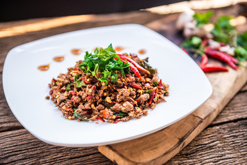 Thai Food Rice topped with egg and stir-fried beef and basil, famous street food in Thailand, fast food, soft focus