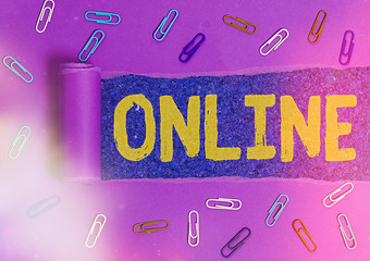 Conceptual hand writing showing Online. Concept meaning the computer or device connected to a...