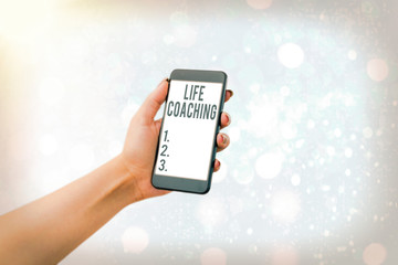 Writing note showing Life Coaching. Business concept for an individual employed to help showing...