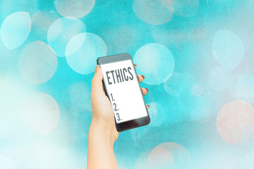 Handwriting text Ethics. Conceptual photo the moral philosophy or code of morals practiced by an...