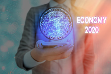Text sign showing Economy 2020. Business photo showcasing State of wealth and resources of a...