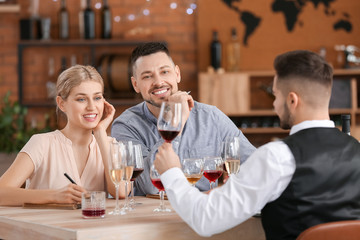 People tasting wine at the restaurant