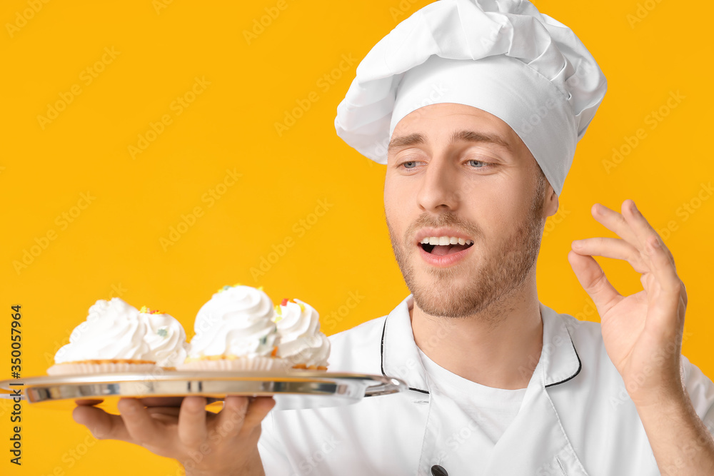 Sticker Male confectioner with tasty dessert on color background