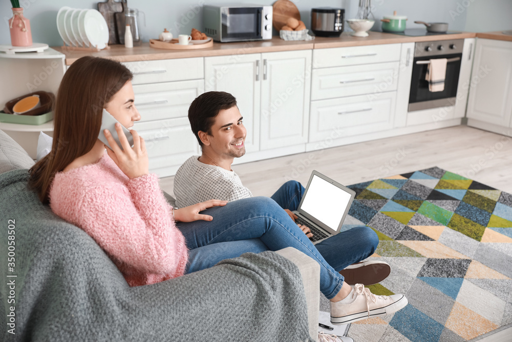 Sticker Young couple working together at home