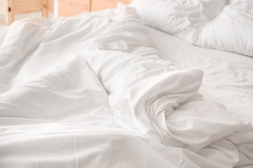 Fototapeta na wymiar Big comfortable bed with clean linen in room