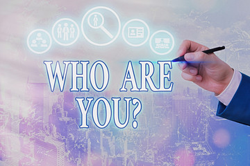 Conceptual hand writing showing Who Are You Question. Concept meaning asking about someone identity...
