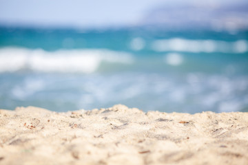close up on white sand and sea waves travel background