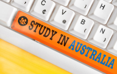 Conceptual hand writing showing Study In Australia. Concept meaning going into foreign country...