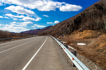 cliff above the road